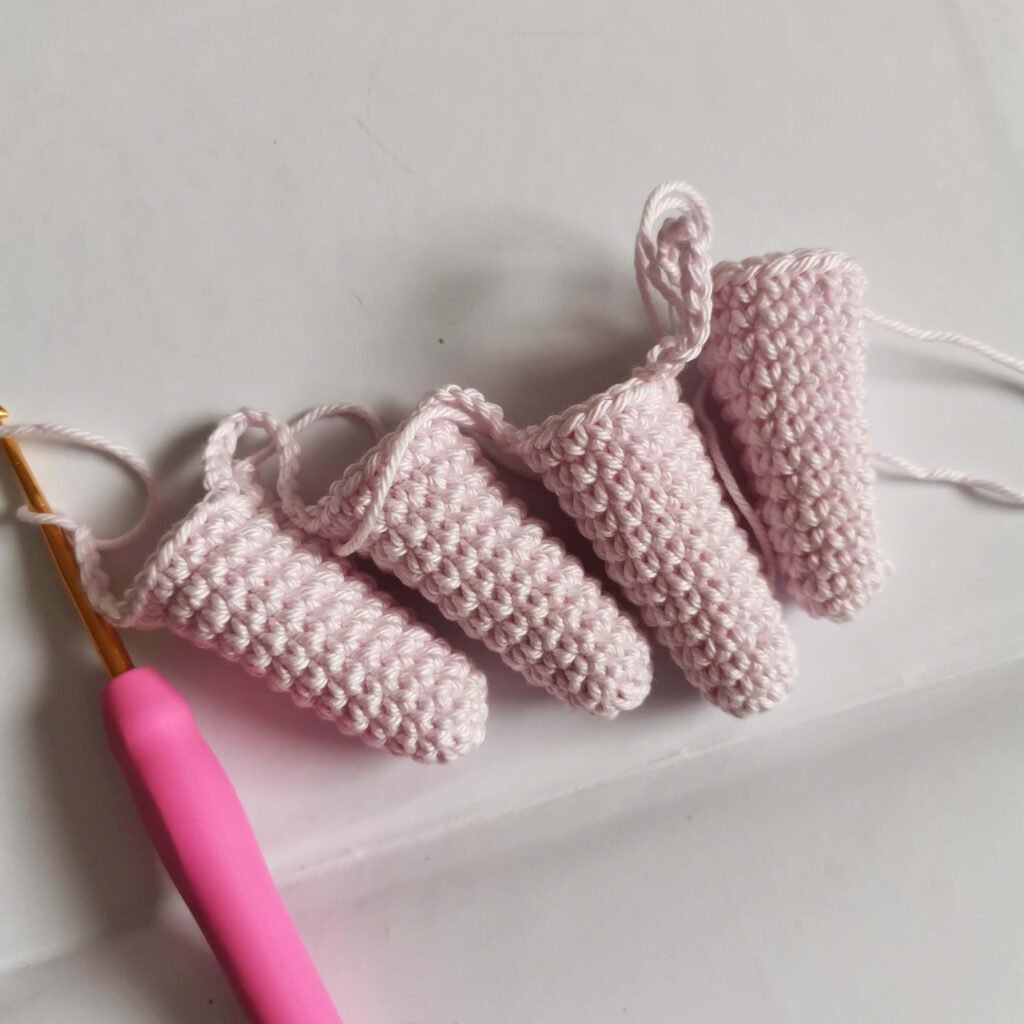 crochet legs, part of pink amigurumi unicorn